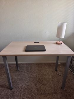 Wooden minimal desk with cord organizer