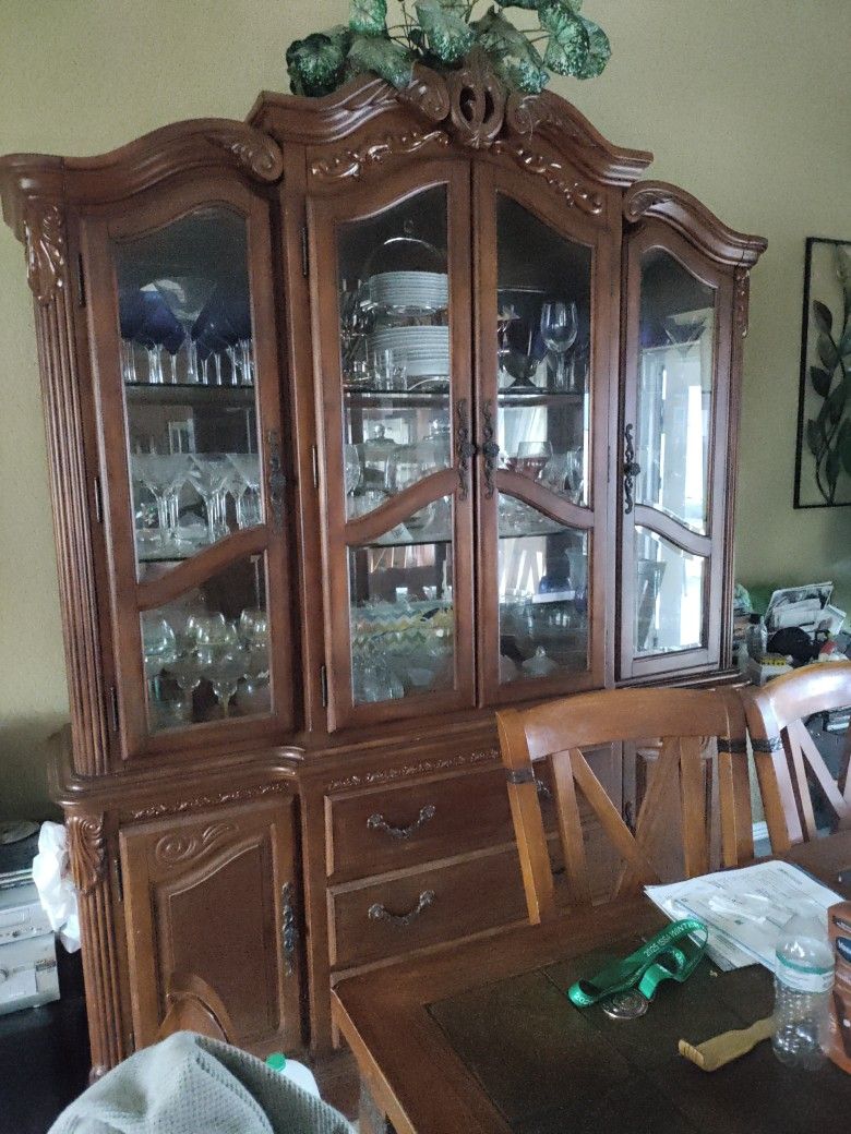 China Cabinet With Lights And Beveled Glass On Door Panels Glass Shelve Inside