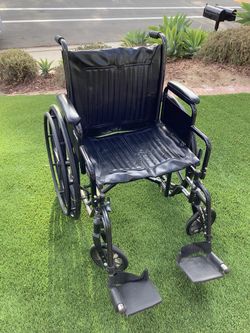 Black Manual Wheelchair with Footrests