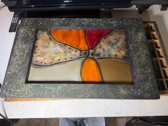 Colorful art piece with metal frame