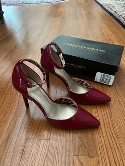 These are Christian Siriano  red patent finish pointed high heel pumps size 7 1/2