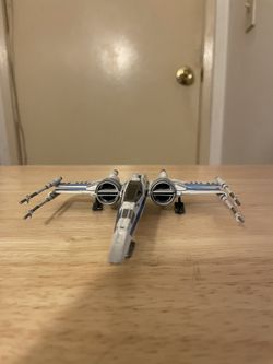 Blue X-Wing With BB-8 Behind The Cockpit