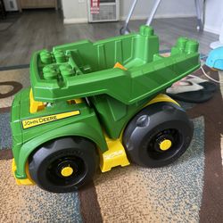 Dump truck with blocks