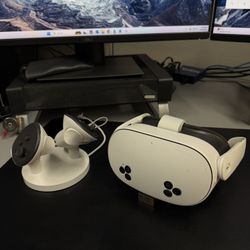 Meta Quest 3S 128GB with Charging dock for headset and controllers.