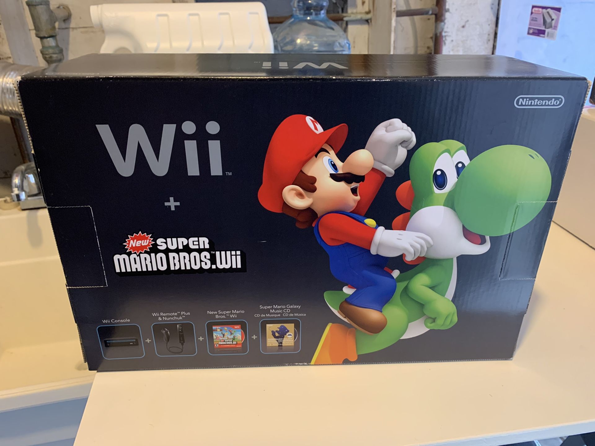 Nintendo Wii Black console + Super Mario Bros Holiday Bundle
