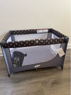 Brand new in box baby play pen with mattress and carry bag