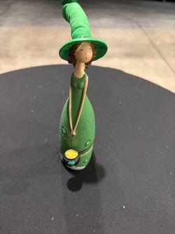 St. Patrick's Day decor, folk art figurine, Irish lucky charm, pot of gold statue, green witch doll, whimsical holiday decoration, leprechaun lady.