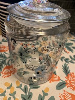 Glass jar with lid - different dog outlines all over