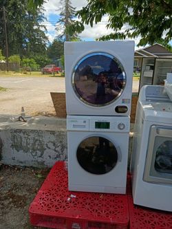 Advanced Appliances Stacked Laundry Center, likely featuring a washer model like the EW 824N and a corresponding dryer model.The set is designed for c