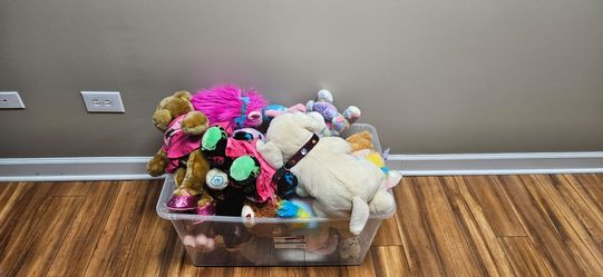 Bin of stuffed animals