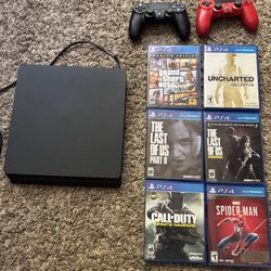 PS4 with games and two controllers 