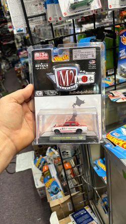 Collectible Mijo Exclusive M2 1969 Datsun Bluebird 1600. 1:64 scale diecast collectible.