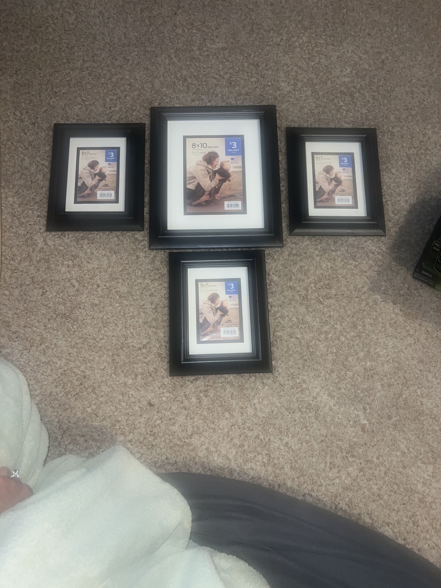 4 picture frames. 3 are 5” x 7” the other is 8” x 10”. The smaller ones fit 3 1/2” x 5” or 4” x 6” photo. Larger frame fits 5” x 7” photo 