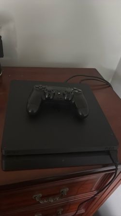 PS4 with controller, hdmi, charger, and power cord