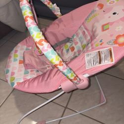 Pink Baby Bouncer with Colorful Pattern