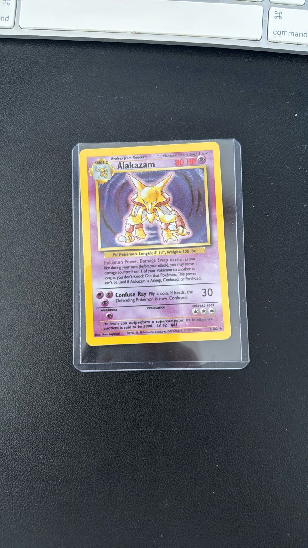 Pokémon Base Set Alakazam Holo #1/102 (1999) – Vintage NM