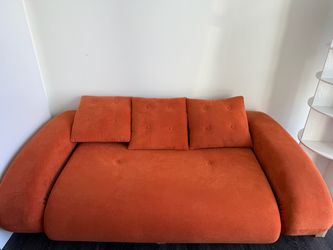 Burnt Orange Curved Deep Lounge Sofa / Pull out bed