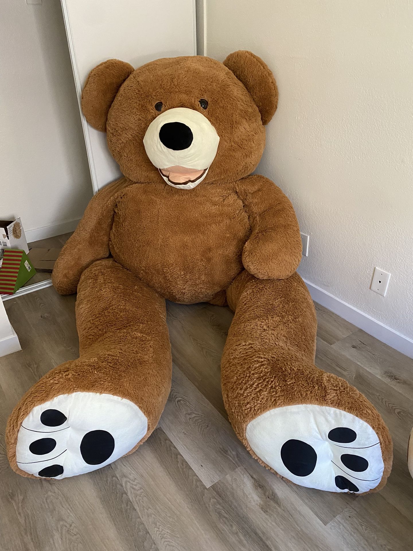 Giant teddy bear, brown cuddle sofa, bear