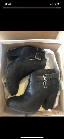 Women’s black heeled booties size 7