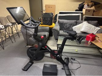 Peloton with shoes and weights