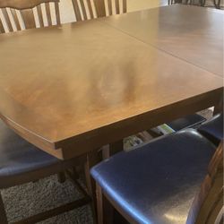Dining Table With An Extension (6 )Chairs 