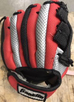 Gray red and black baseball mitt