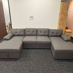 Large dark gray u-shape sleeper sofa bed with double storage chaise 