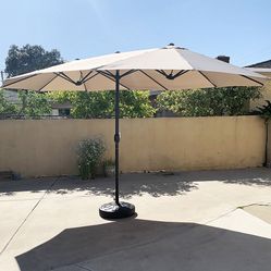 New in box $130 Large 15 FT Double Sided Outdoor Umbrella with 65 LBS Plastic Weight Base (Beige color) 