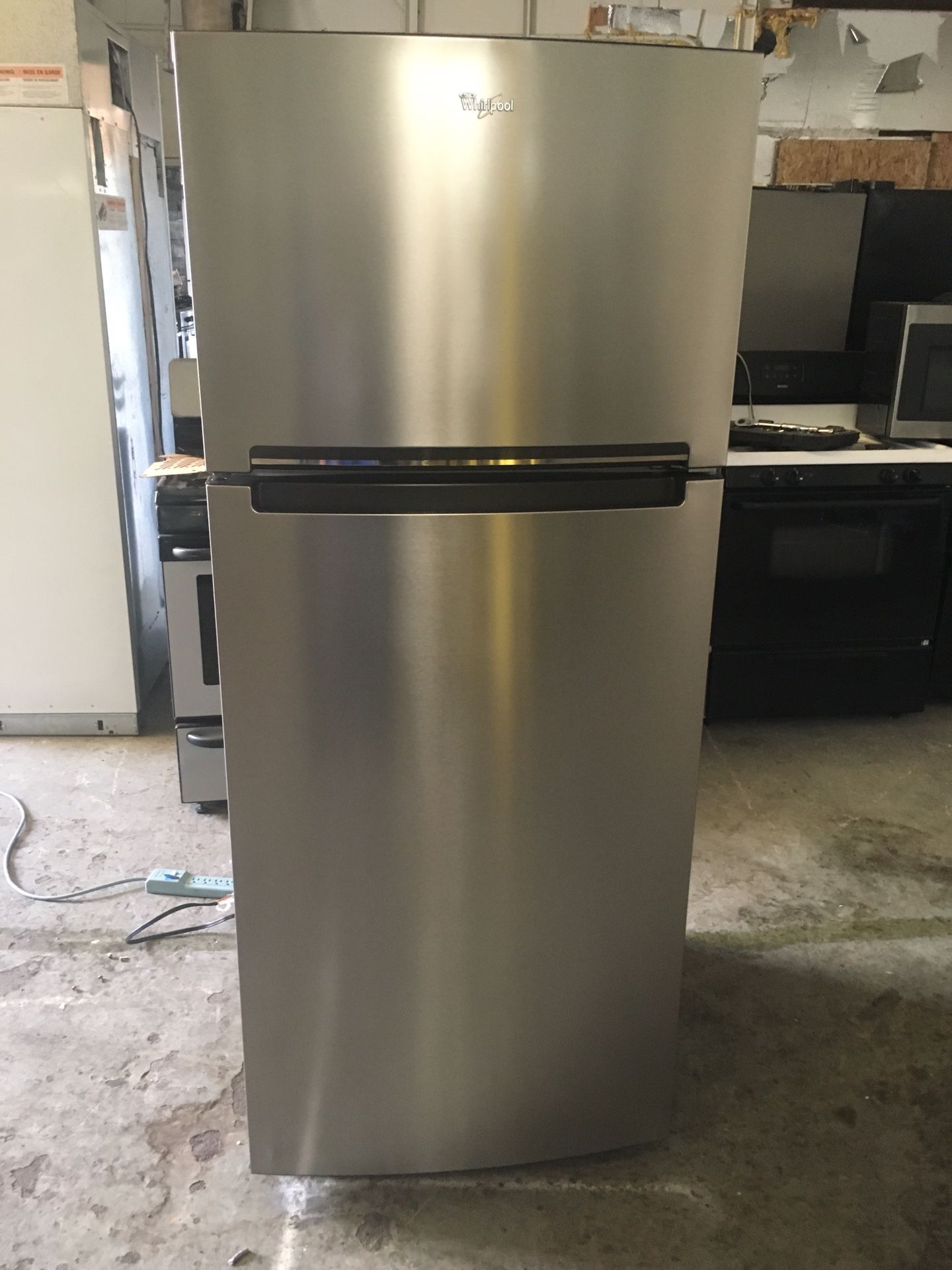 Refrigerator brand whirlpool everything is good working condition 90 days warranty delivery and installation