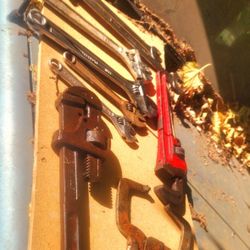 Bunch Of Heavy-duty Inch And A Half Pliers And Wrenches
