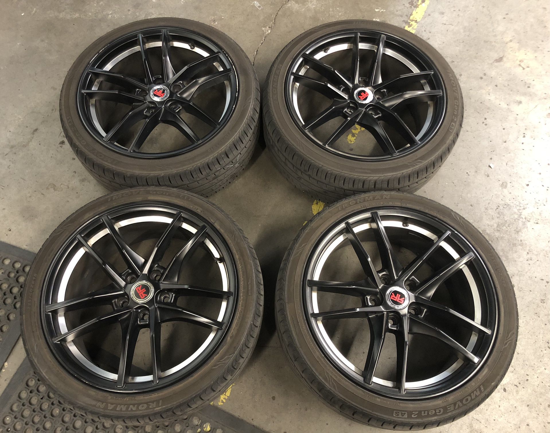 used set of Revolution Racing Rr28 Wheel 18x8  +40 offset 5x114.3 flat Black w/ silver Ring with 235/40/18 Tires