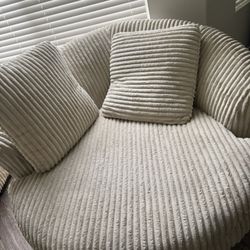 Spinning Off White Couch 
