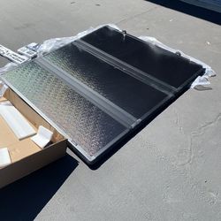 Brand new Toyota Tacoma truck bed cover 5ft