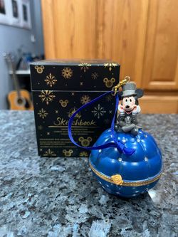 Disney Mickey  Mouse Engagement Ring Proposal Box & Christmas Ornament.  The inside has  “Will you marry me?”.  You can take the ring out and put your