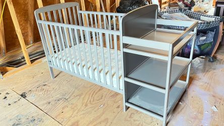 Baby crib with mattress