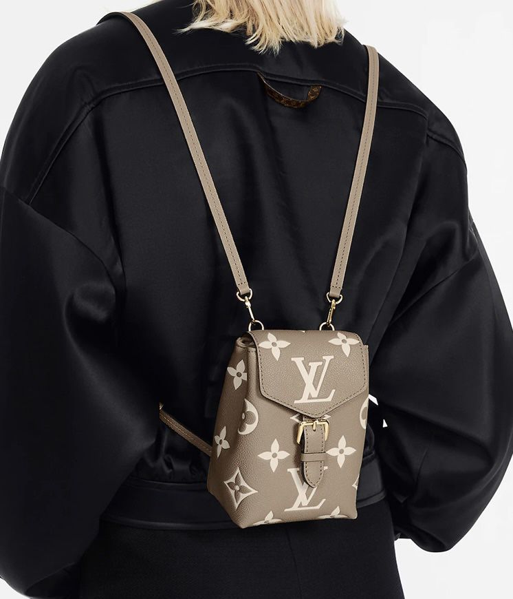 Shop Louis Vuitton MONOGRAM EMPREINTE Tiny backpack (M80738) by