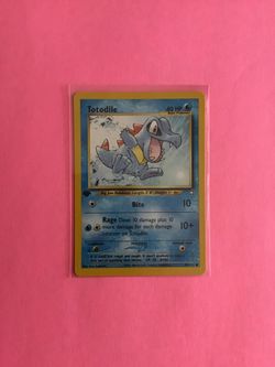 1st edition Totodile 80/111 Pokemon Card from Neo Genesis Set
