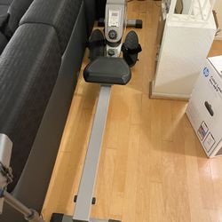 Sunny Health & Fitness Rowing Machine With Extended Slide Rail