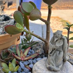 Chinese mudman figurine