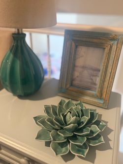Sage green lamp and decorations