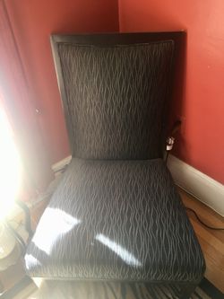 2 beautiful Black and Tan colored chairs hardly ever used