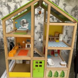 HAPE All Seasons Kids Wooden Dollhouse 
