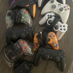 10. Random Controllers For Xbox And Playstation With A Playstation I Toy Camera.