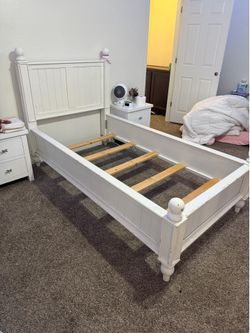 Two white pottery barn twin beds $250 each