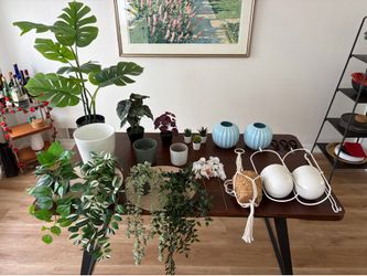 Assortment of fake plants, pots, hanging planters, etc .