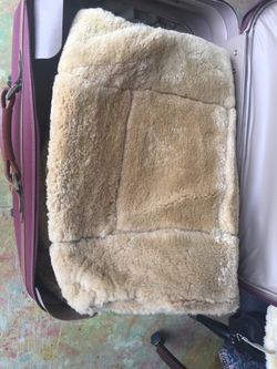 2 matching sheep skin car seat covers