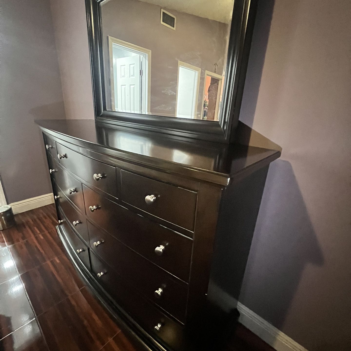 Bedroom Dresser With an Attached Mirror