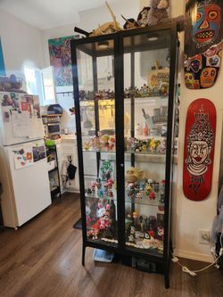 Glass Door Cabinet (toys not included)