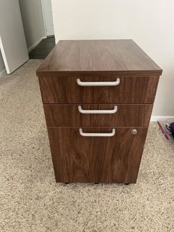MOVING SALE: HEAVY DUTY WOODED FILE CABINET WITH LOCK.