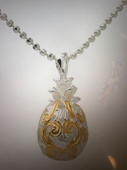 Silver pineapple scroll pendant two tone chain included